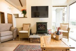 The flatscreen television at Brynymor Cottage self-catering accommodation, Llangennith, Gower