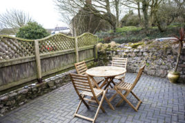 The patio area at Corn Cottage self-catering accommodation, Rhossili, Gower
