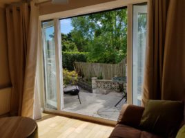 Access to the patio from the lounge at Sea Breeze Apartment 3, Horton, Gower