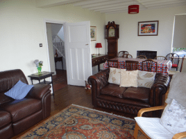 The sitting room and dining room at Sunnyside holiday home, Rhossili, Gower