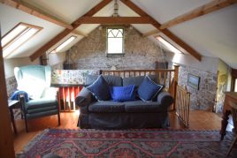 Upstairs sitting room at Delvid Stables holiday home, Llangennith, Gower