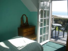 Bedroom balcony with sea views at Hollies holiday cottage, Horton, Gower