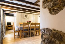 The dining room at The Bower Cottage self-catering thatched cottage, Port Eynon, Gower