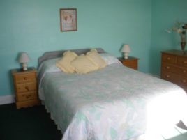 A double bedroom at Hollies self-catering cottage, Horton, Gower Peninsula