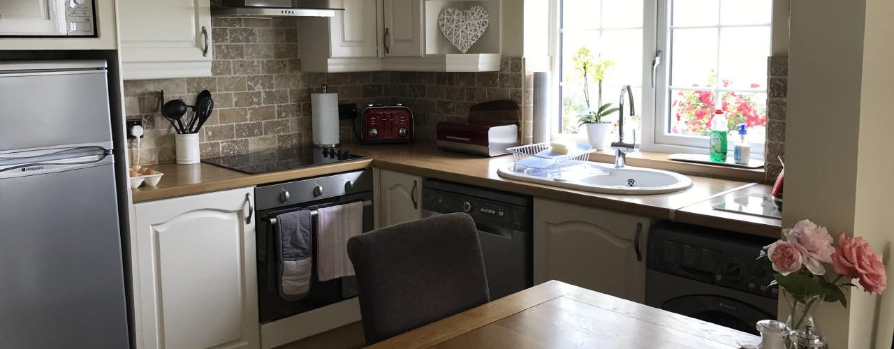 The kitchen at Coastal View holiday apartment, Oxwich, Gower