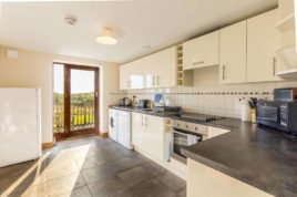 The kitchen at The Tractor House holiday cottage, Llethryd, Gower