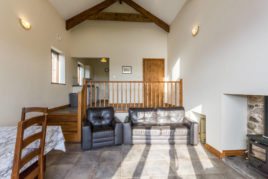 The living area at The Barn holiday cottage, Llethryd, Gower Peninsula