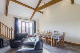 The living area at the Tractor House holiday cottage, Llethryd, Gower