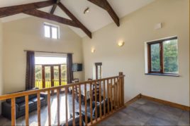 The living room at The Barn holiday cottage, Llethryd, Gower Peninsula