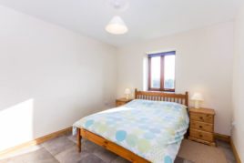 The master bedroom at The Tractor House holiday cottage, Llethryd, Gower Peninsula