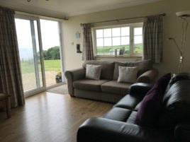 The lounge at Coastal View self-catering apartment, Oxwich, Gower Peninsula