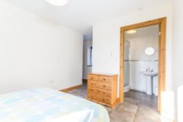 The master bedroom at The Tractor House self-catering cottage, Llethryd, Gower