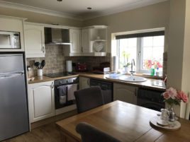 The kitchen at Coastal View holiday apartment, Oxwich, Gower