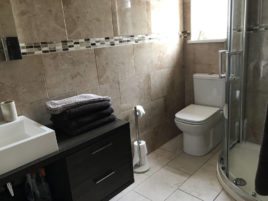 The shower room at Coastal View holiday apartment, Oxwich, Gower